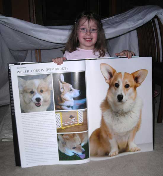 Rachel with the Big Dog Book in her tent