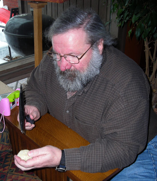 Butch breaking the geode open