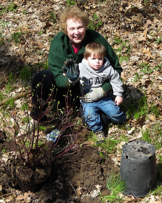 Karen and Ben Planting the Red Stick Dogwood