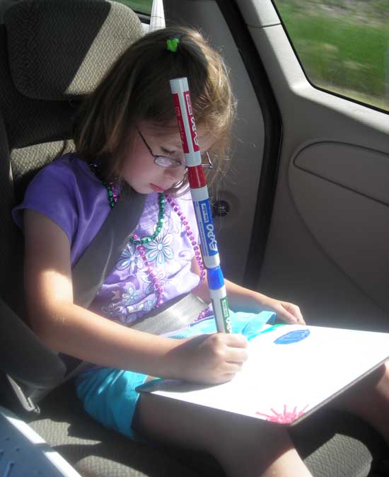 Rachel Drawing on the way to Racine