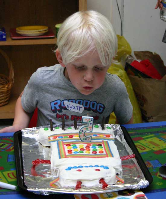 Wyatt blowing out his candles